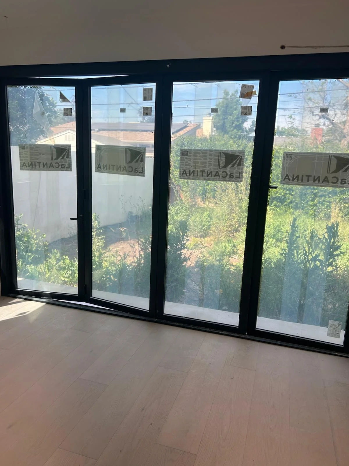 Folding glass doors and floors cleaned in a bright interior